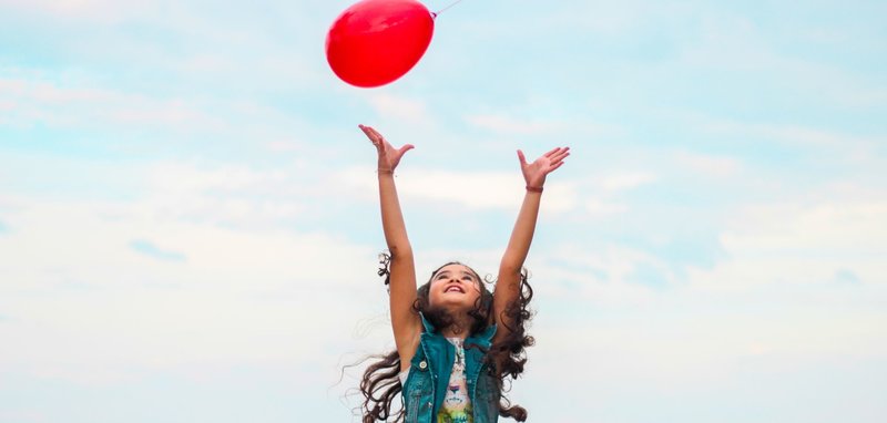 Mädchen mit Luftballon